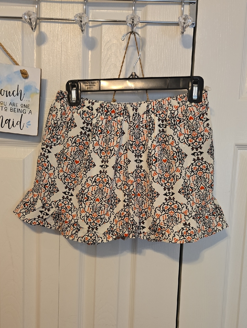 Women's Printed Ruffle Skort in White with Black & Orange Motif